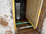 Graben mit querenden Leitungen