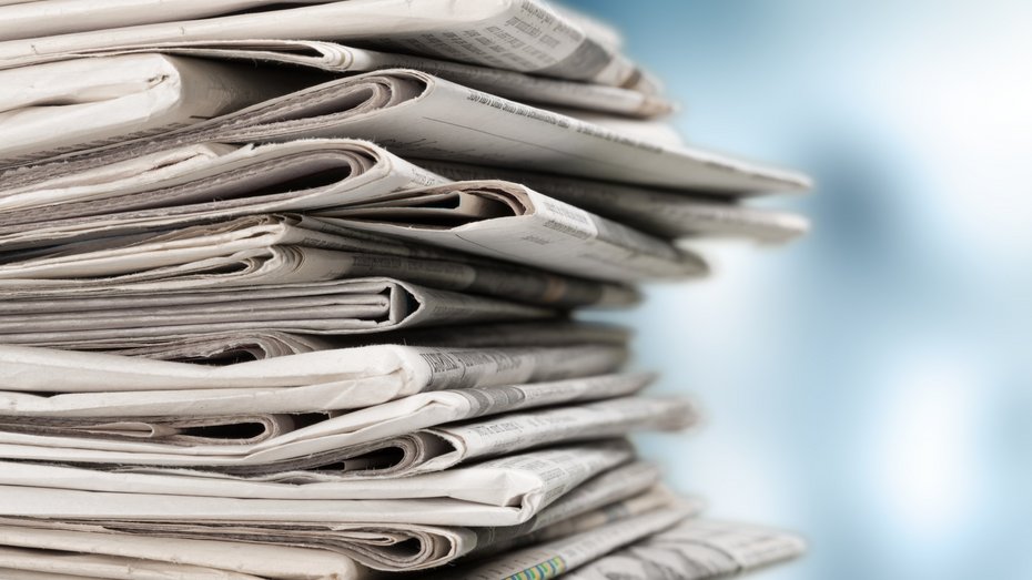 Pressemitteilung Symbolbild Zeitungsstapel