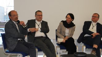 Diskussionsrunde, Herr Eble, Herr Kiwitt, Frau Bay, Herr Mandel (v.l.n.r)