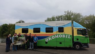 Gruppenfoto mit Ökomobil
