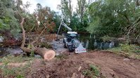 Wiederherstellung des Abflussquerschnittes nach einem Sturm am Gewässer I. Ordnung.